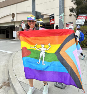 Flags-at-Pride-picket-outside-Warner-Bros.jpg