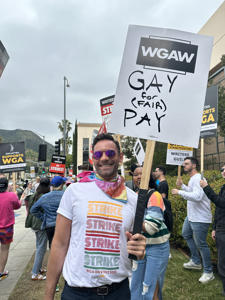 Gay-for-fair-pay-sign.jpg