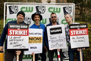 Actors-Theo-James-Noah-Wyle-and-Justin-Kirk-at-the-WB-CW-picket.jpeg
