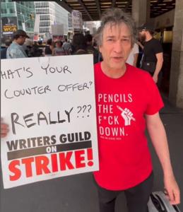 WGAE-member-Neil-Gaiman-dons-a-red-shirt-for-the-first-time-since-1987-to-strike-for-young-writers.JPG