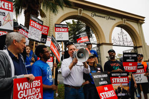 Rep.-Adam-Schiff-with-offers-words-of-encouragement-to-picketers-at-Paramount.jpg