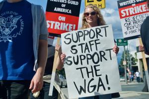 Picketer-with-Support-Staff-Support-the-WGA-sign.jpeg
