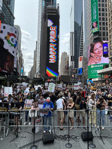 The-scene-at-Broadway-Day-in-Times-Square.jpg