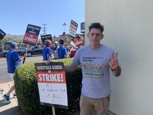 Chris-Weitz-at-feature-writers-picket-at-Paramount.jpg