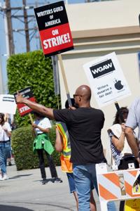 WGAW-Board-Member-Eric-Haywood-at-the-Juneteenth-picket-at-Paramount.jpeg