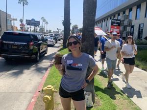 Lindsay-Villareal-and-hero-cactus-prop-from-Mad-Men-at-Netflix-picket.jpg