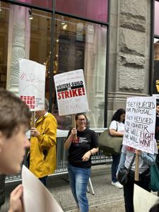 Picketing-Netflix-NYC-in-the-rain.jpg