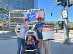 Picketing-is-a-family-affair-at-Universal.jpg