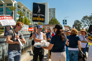 DGA-handing-out-food-and-drinks-to-picketers.jpg