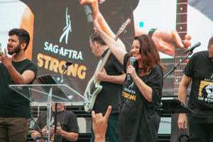 SAG-AFTRA-President-Fran-Drescher-takes-the-stage-at-the-L.A.-Solidarity-March-_-Rally-outside-Paramount-Studios-on-9-13.jpg