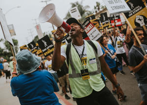 SAG-AFTRA-strike-captains-on-the-bullhorn-at-the-L.A.-Solidarity-March-and-Rally-on-9-13.-Photo-J.W.-Hendricks.jpg