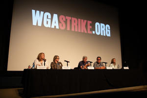 WGA-Negotiating-Committee-Co-Chair-Chris-Keyser-answers-a-question-during-the-September-11th-Captain’s-Meeting-at-the-Writers-Guild-Theater.jpg