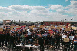 Teamsters-raising-their-signs-at-the-end-of-their-Rally-for-Good-Jobs-and-Safe-Streets-on-9-18.jpg